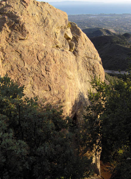 The shorter, less difficult left side of the Upper Fire Crags. The top portions of "Europe Revisited", "Tester", "Short Shot" and "Bent Brain" are visible through the shrubbery.