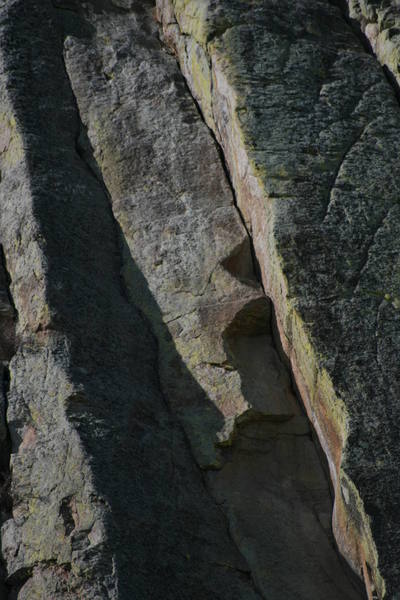 This BEAUTIFUL route pulls through a series of roofs. One crack right is "Gooseberry Jam"... and one crack left (in the shadow) is "Casper College".
