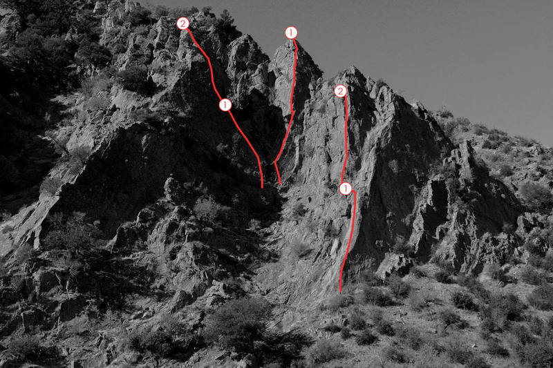 This photo shows the three major routes on the right side of the Fortress. From right to left, these are "Free to Choose" (5.8), "Permanent Income Hypothesis" (5.9+), and "Capitalism & Freedom" (5.10a).