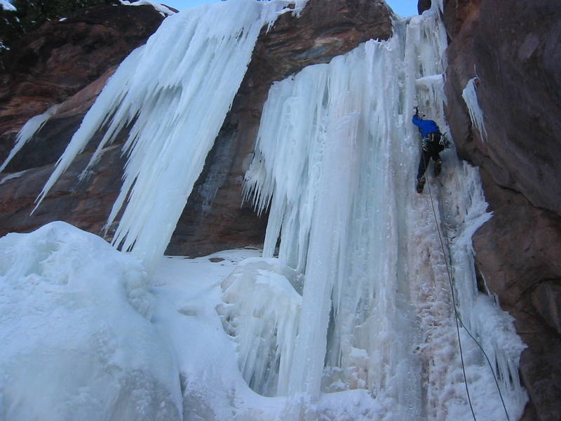 Chris Sheridan stepping out of the frying pan and into the fire on the first pitch of the Redstone Slabs. Photo taken 3/3/07.