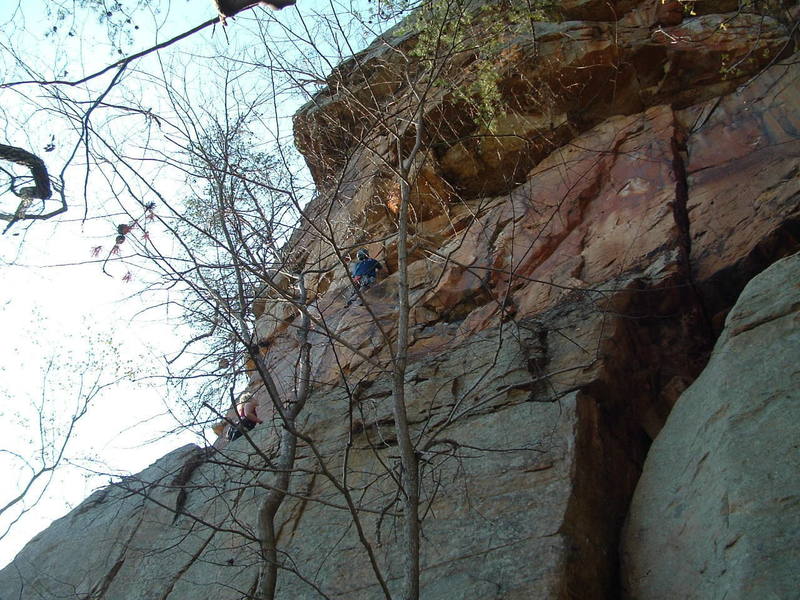 Climbing pitch 2. Pitch 1 follows the right leaning crack below the belayer