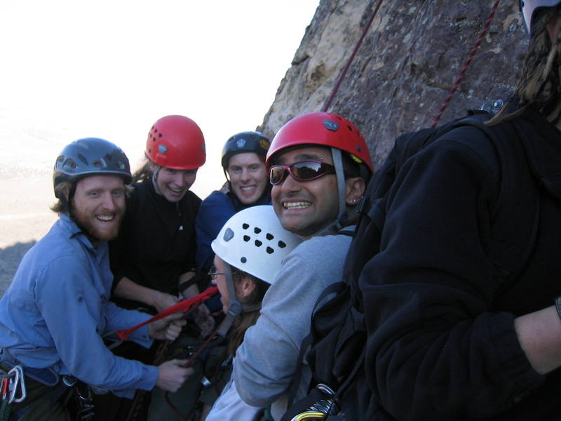The "nice ledge" atop pitch 4 mentioned in the super topo is not so nice for 8 people. There are two people that are out of frame.