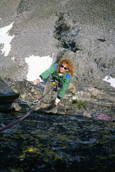 Bonnie Von Grebe about half way up the classic Northeast Ridge route on the Sharkstooth.