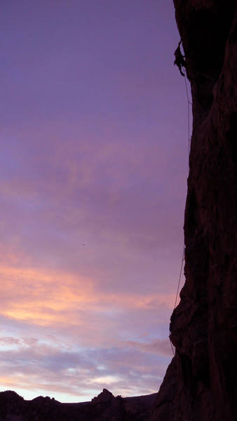 Sunset climbing on "Colossus, 5.10c, at City of Rocks, ID in July 2006. Photo by Bill Geist.