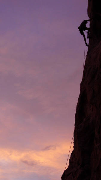 Sunset climbing on "Colossus, 5.10c, at City of Rocks, ID in July 2006. Photo by Bill Geist.