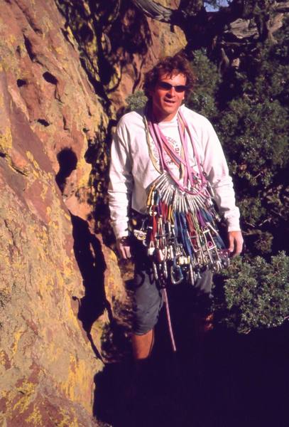 Runout? Yes, I ran out of gear to pack this thing with, despite taking both our racks.<br>
Matt Robertson proudly displays the peices I placed in our ascent, (27 pieces of gear & one threaded eyelet), as he commented on in November 2001. Photo by Tony Bubb.