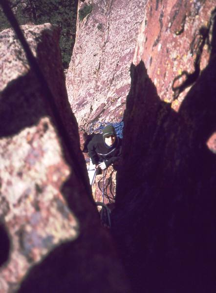 Joseffa Meir ponders her fate as she looks up through the starting slot of 'Initial Hangover' on Eldo's West Ridge. Photo by Tony Bubb, 2002.