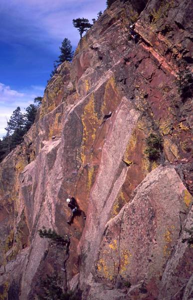 An unknown climber follows 'Pony Express (5.11)' on Eldo's West Ridge. Photo by Tony Bubb, 2003.
