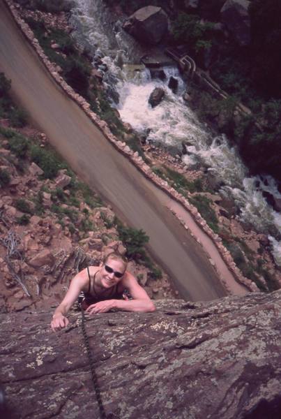 Jenny Schillinger tops out on the West Face of the Bastille in July 2003. Photo by Tony Bubb.
