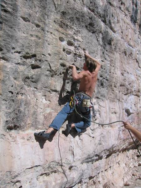 Me gliding through the first bolt with some extra strength on "God Walks Amoung Us" 12b on the way gone wall