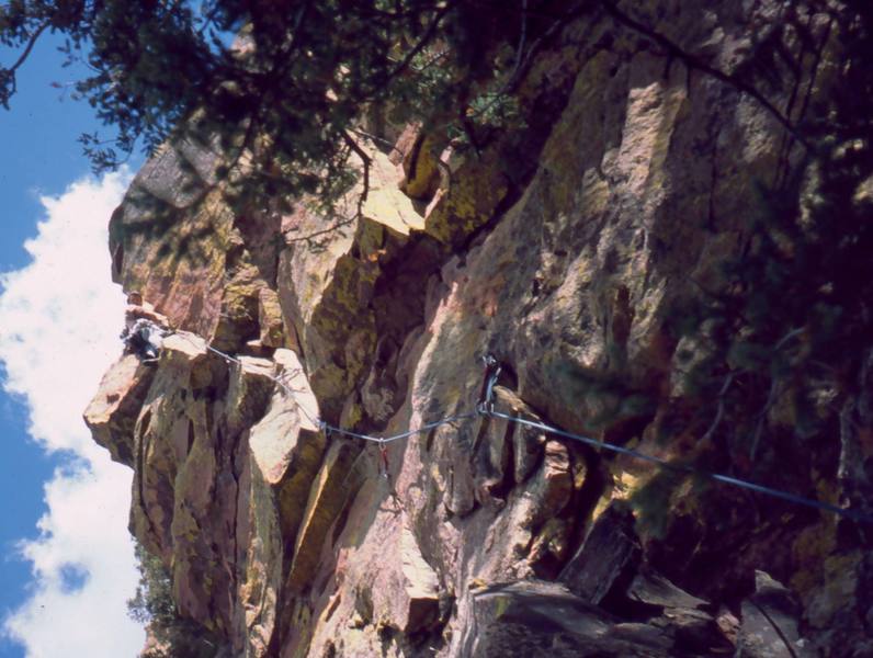 Tony Bubb just past the Run-outs and crux of Double Life (5.10-, R), on Shirt Tail Peak in Eldo. Photo by Joseffa Meir, 2003.