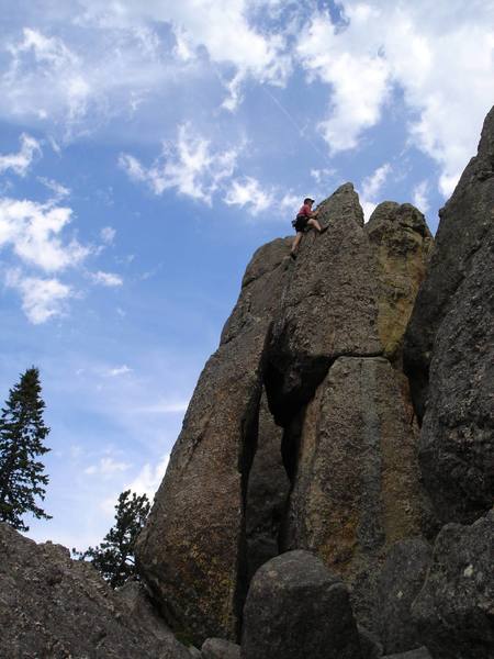 Burt Lindquist nears the summit of Stonehenge while climbing One Epic Leads to Another.