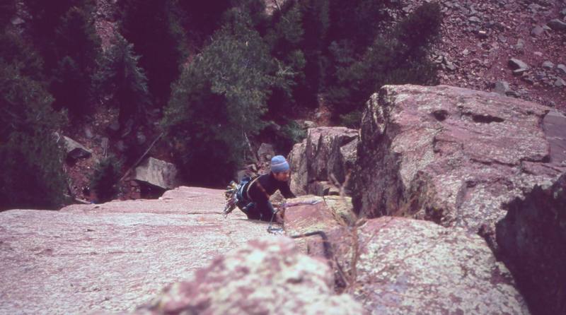Jer Collins following P2 of the 'Center Route (5.11a)' on Rincon Wall in 2003. Photo by Tony Bubb.