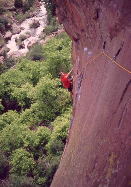 Josh Janes following at the first crux of 'Le Boomerang (5.11d)' on Eldo's Redgarden Wall, in 2004.