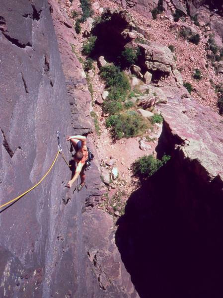 "Maybe more like this?" Josh Janes twisted in crux of 'Night (5.11)' on Eldo's Redgarden Wall. Photo by Tony Bubb in 2004.