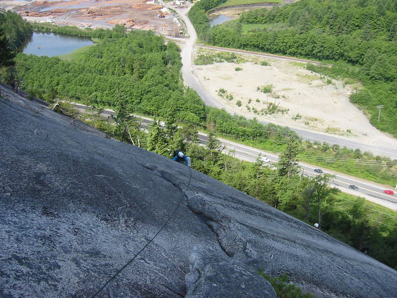 Joanne Robertson somewhere on the first three pitches of Diedre. With a 70m rope you can link all three of the first pitches.