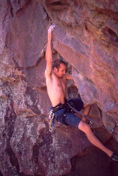 Shane Zentner arrives at the crux of 'M' on the Whale's Tail in Eldo. Photo by Tony Bubb, 2004.