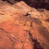 Dave Stewart follows up to the crux on P2 of 'Three Old Farts Young At Heart (5.10)' on Eldo's Redgarden Wall. Photo by Tony Bubb, 2004.