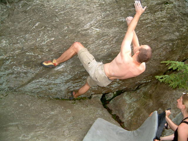This problem is on the path down from the top to the middle section on the left side of Deer Leap. It looked just too nice to pass up. Crux start with spicy topout. Don't know name nor grade, but recommend it.