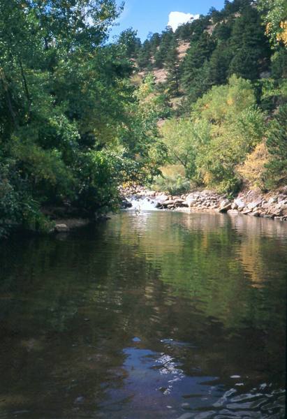 The Boulder Canyon streamside is virtually deserted at mid-weekday but can be a huge social scene on weekends and hot afternoons. This is a good palce to cool your feet after climbing. Photo by Tony Bubb, Y2K.