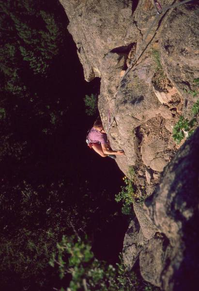 Chris Parks gets some 'Dirty Love' humping the arete at the crux, on Boulder Canyon's Garden Party Wall. Photo by Tony Bubb, 2003.