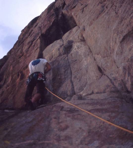 Tony Bubb arrives at the steep section of 'Thumb Tack (5.11+)' at the Bihedral and wiggles in some gear. Don't let the angle of the camera fool you, look at the angle of the rope! Photo by Alan Doak, 2004.