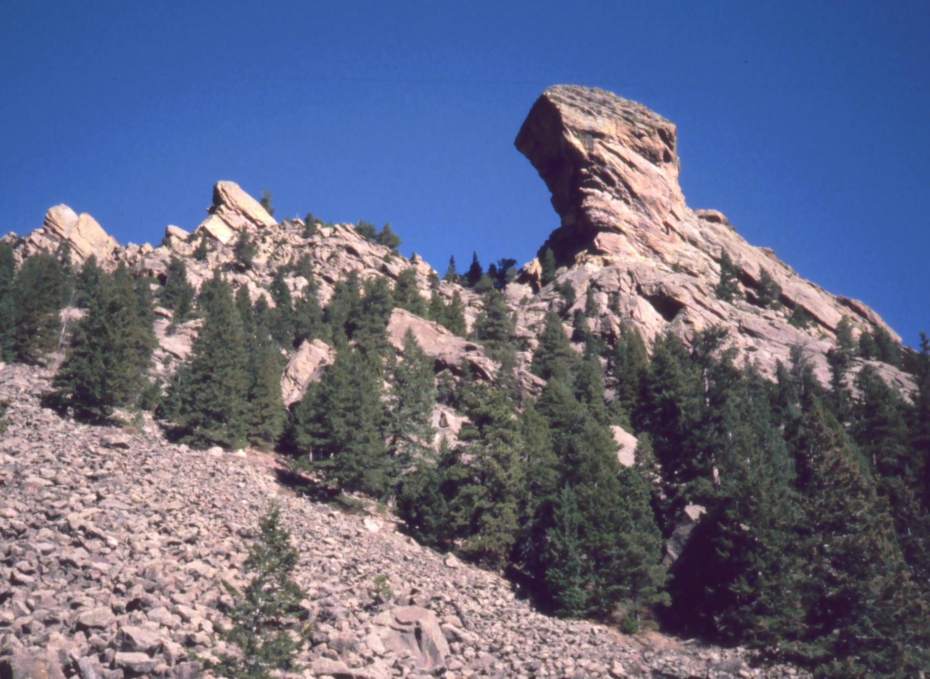 The Devil's Thumb as seen from the Shadow Canyon approach. Although ...