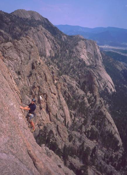 An unknown climber on the final pitch of 'The Nose (5.10)' as seen from 'Idiot Wind' on Lumpy's Sundance buttress. Photo by Tony Bubb, 2002.