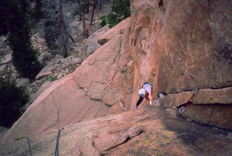 Peter Spindloe follows the Ten Years After (5.10a)' at the Sheeps Nose in the South Platte. Photo by Tony Bubb, ~2001.
