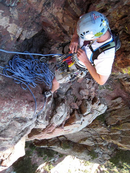 Clint racking up at the eyebolt at the Red Ledge belay.<br>
<br>
