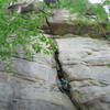 Stuck In Another Dimension (5.11a). New River Gorge, WV. Burly start, powerful finish. Hope you "had your Wheaties!" 
