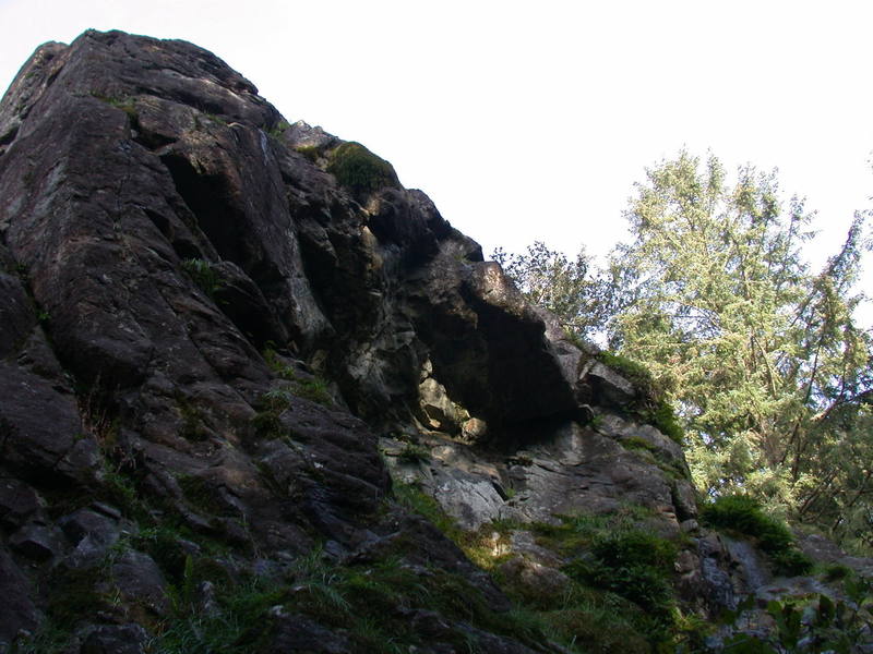 The Edge route follows the left skyline. The roofs to the right have various top rope options including a fun 5.11.