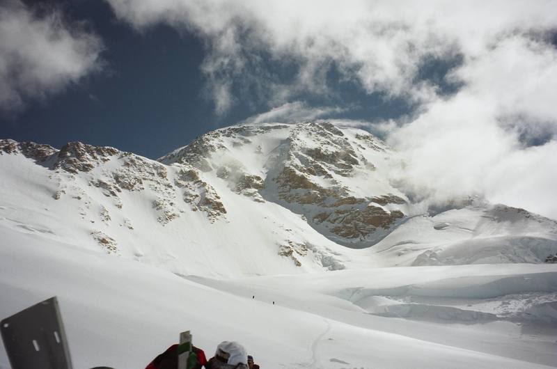 Looking up at the summit from our food cache just past windy corner. June 2003