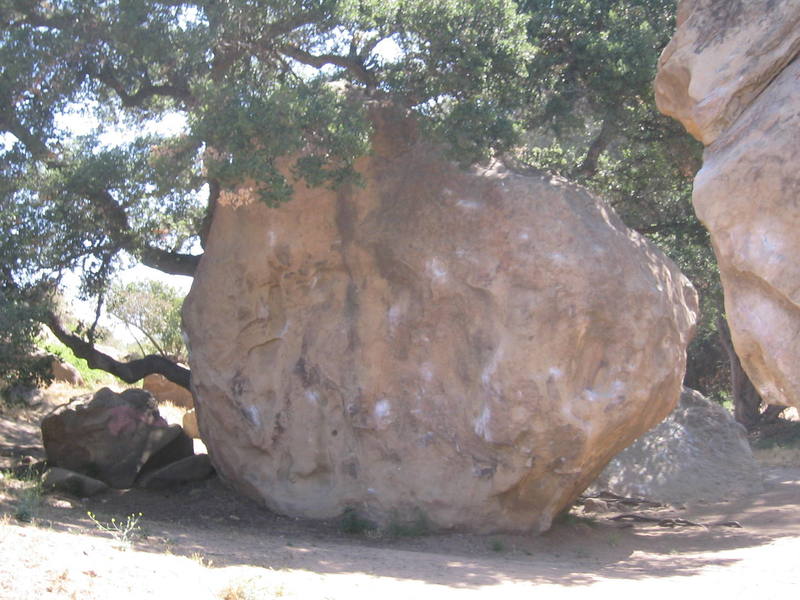 West side of B1 Boulder. Routes L to R: <br>
The corner 5.10a<br>
Coner II 5.11c<br>
Hog Tied 5.10+ TR<br>
Slap Your Puppet 5.12 TR<br>
Master of Reality B1<br>
Expansion Champer B1 OTD<br>
The Ear 5.11+