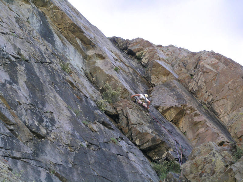 Ryan B. working though the face climbing on pitch two. 