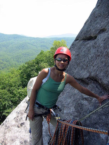 Intrepid second Huong, ready to belay on P2.