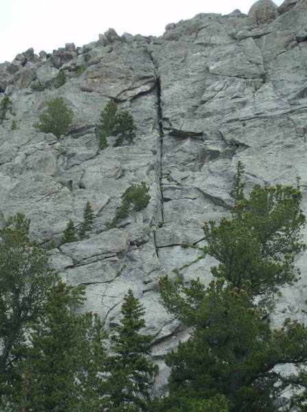 The route goes up the biggest, deepest looking crack from the ground. The roof pitch is right under the dark overhang and is surprisingly easy to negotiate.