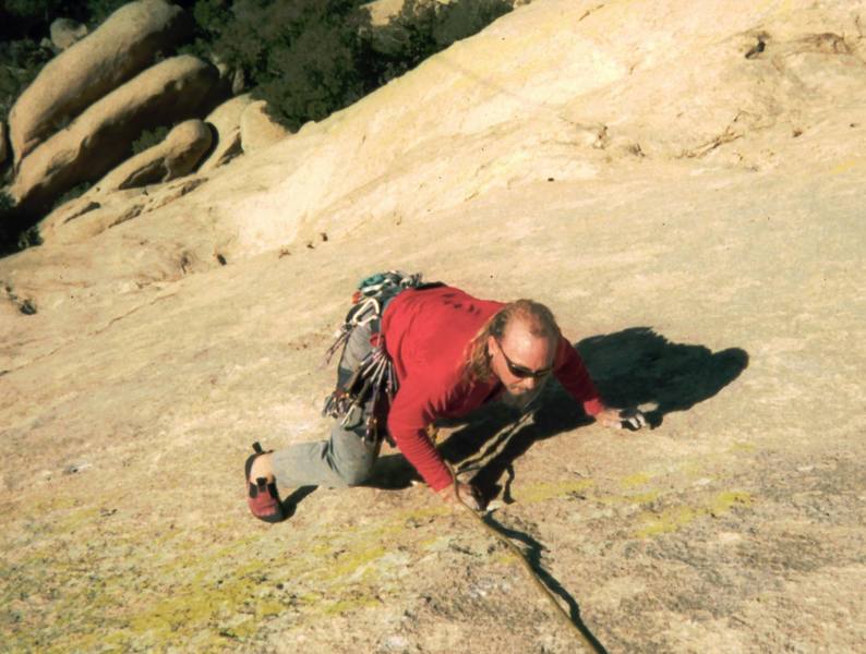 Ron Roach searches for somehting resembling a hold on the lower pitches of 'Warpaint.' Photo by Tony Bubb 12/25/2001.