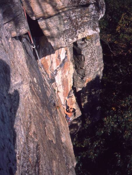 Michelle Moffat emerges from the second crux of Matinee' (10d) at the gunks. Photo by Tony Bubb, 10/03.