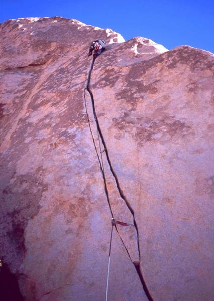 Chris Parks nears the end of the perfect handcrack on "Room To Shroom" (5.8). Photo by Tony Bubb, 1/04.