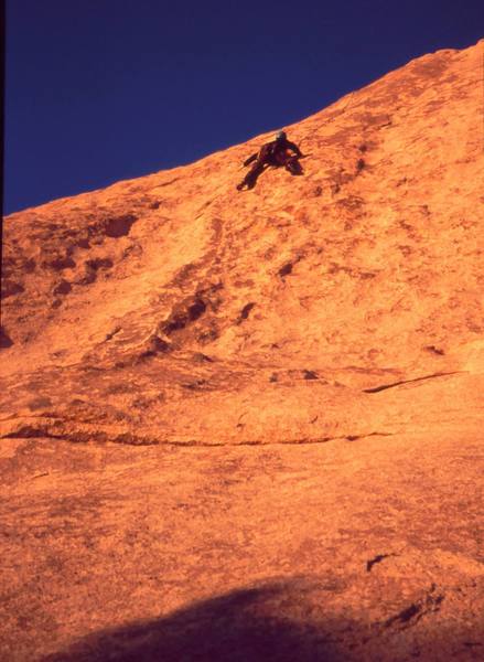 Chris Parks follows 'Lead Us Not Into Temptation' (5.9) at Sunset. Photo by Tony Bubb, 1/04.