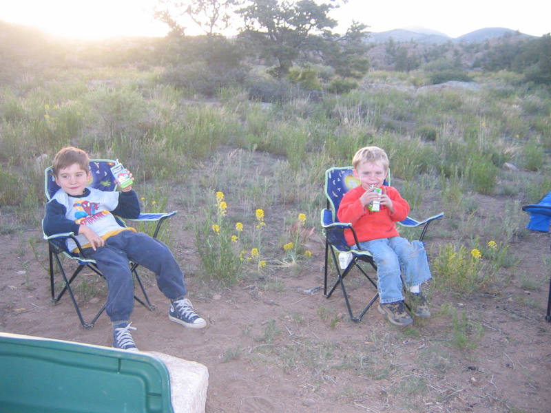 Cody and Miles chillin out, drinking some nice cold apple juice after a long day's climbing in Penitente Canyon, CO. June 2007.