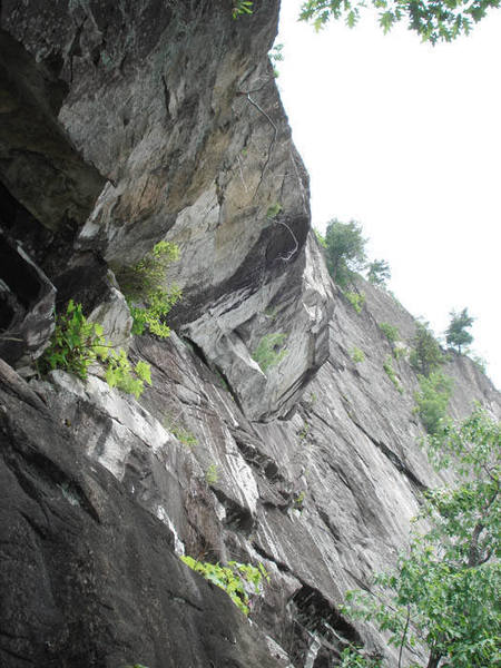 Looking up the arching first pitch a long, layback crack....
