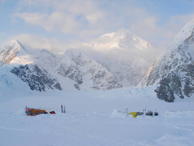 Advanced Base Camp, 6,800 feet, and the view up the Northeast Fork of the Kahiltna Glacier with the west side of Denali in the background.