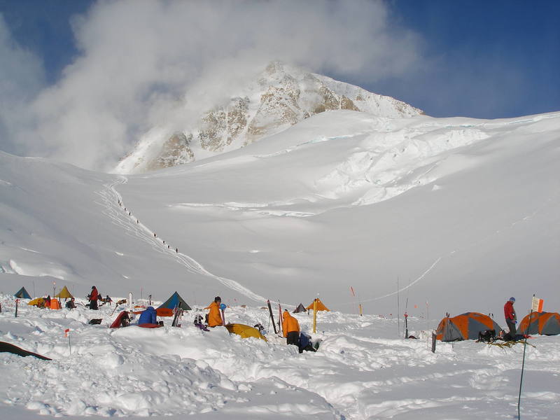 Motorcycle Hill, above the 11,300 foot camp. The smoking pile in the background is the west end of the West Buttress.