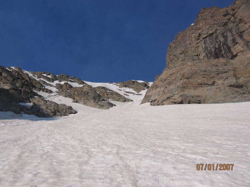 Near the base of the main couloir, when the slope increases dramatically.