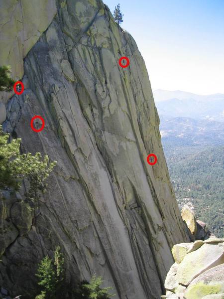 Left climbers are on Igor Unchained finishing the 2nd pitch. Right climbers are on Inner Sanctum. Bottom climber is at a belay.