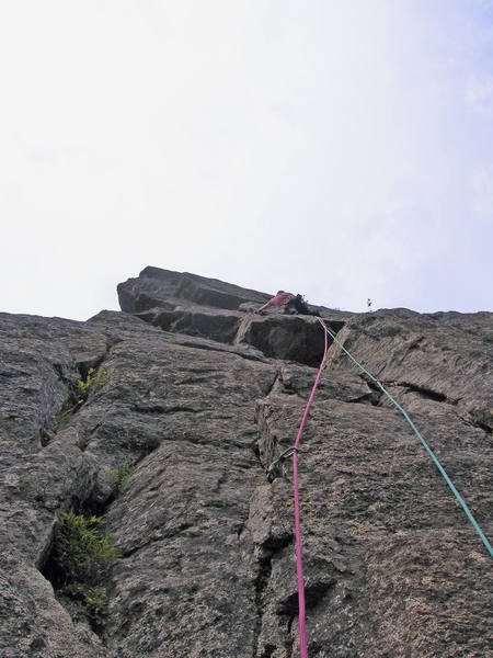 Pitch 3. Climbing up towards the traverse.