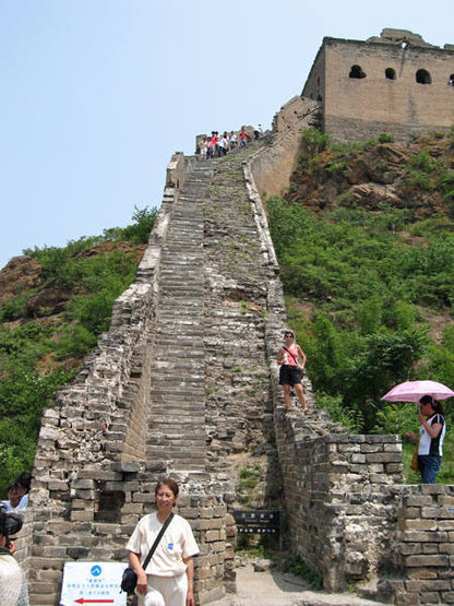 In this area, most tourists are Chinese. They follow the arrow in the lower left and exit the Wall here. Not able to read Chinese arrows, my friends and I headed up the 80-degree stairs and into the adventures ahead.