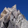 The crux pitch of the Kain route, pinnacle left skyline,